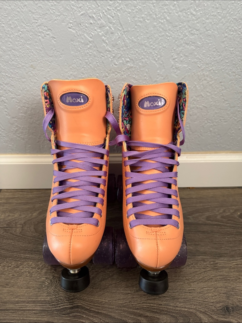 Peach Roller Skates with Purple Laces